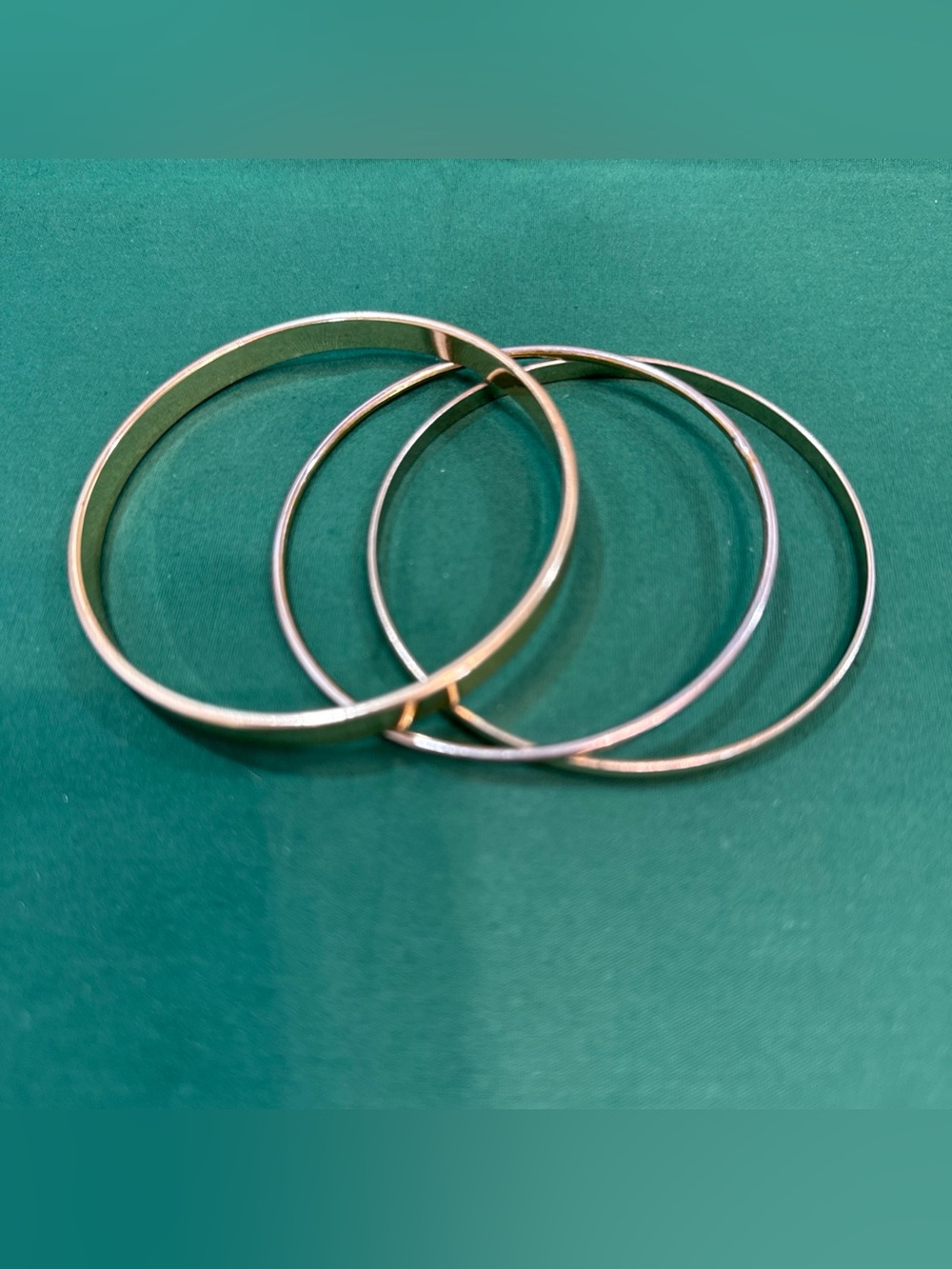 3 Goldtone Stackable Bangle Bracelets. 30E